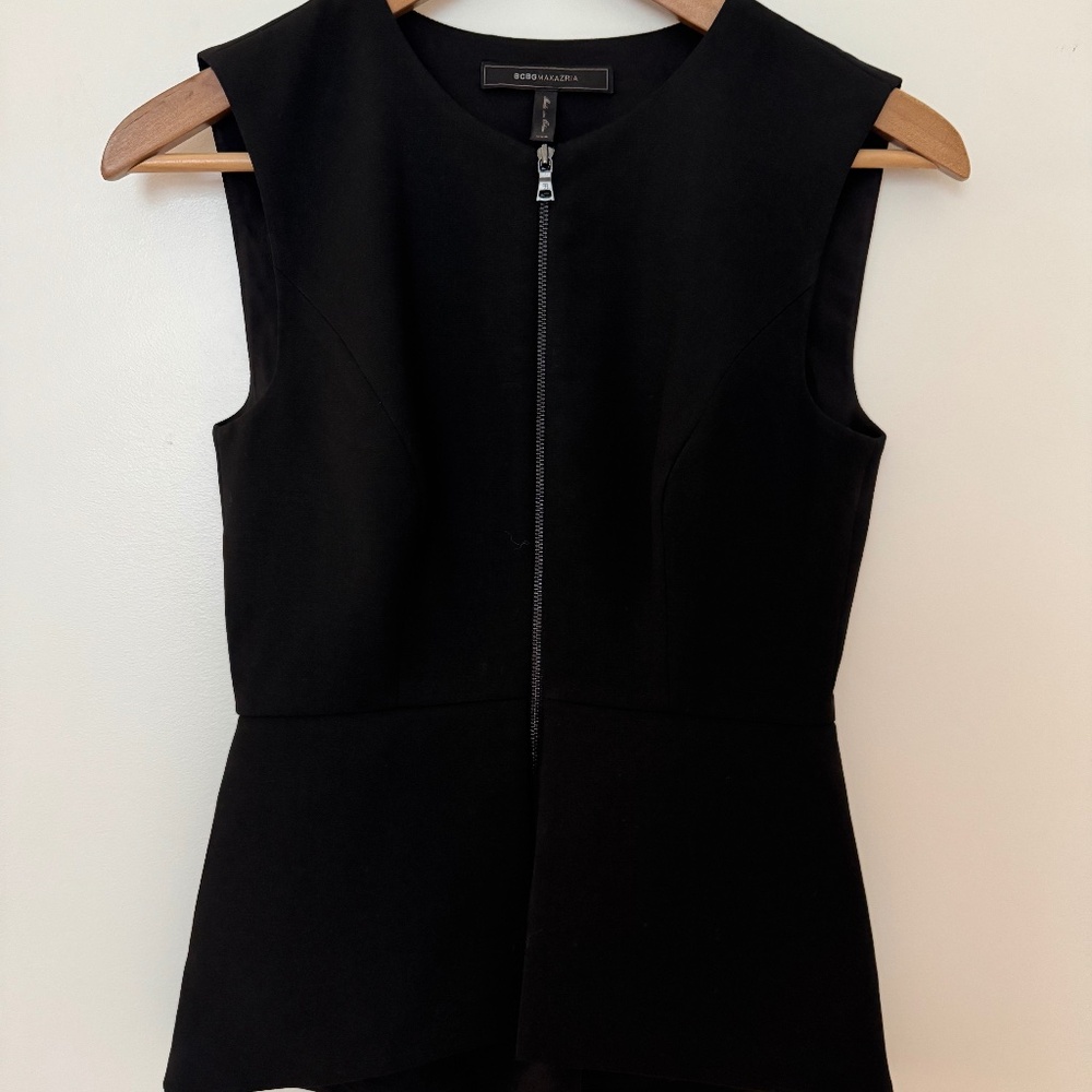 Black peplum top with zip